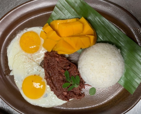 Delicious Bebot Silog - Traditional Filipino Breakfast with Corned Beef, Rice, and Egg at BLISS Restaurant Siargao